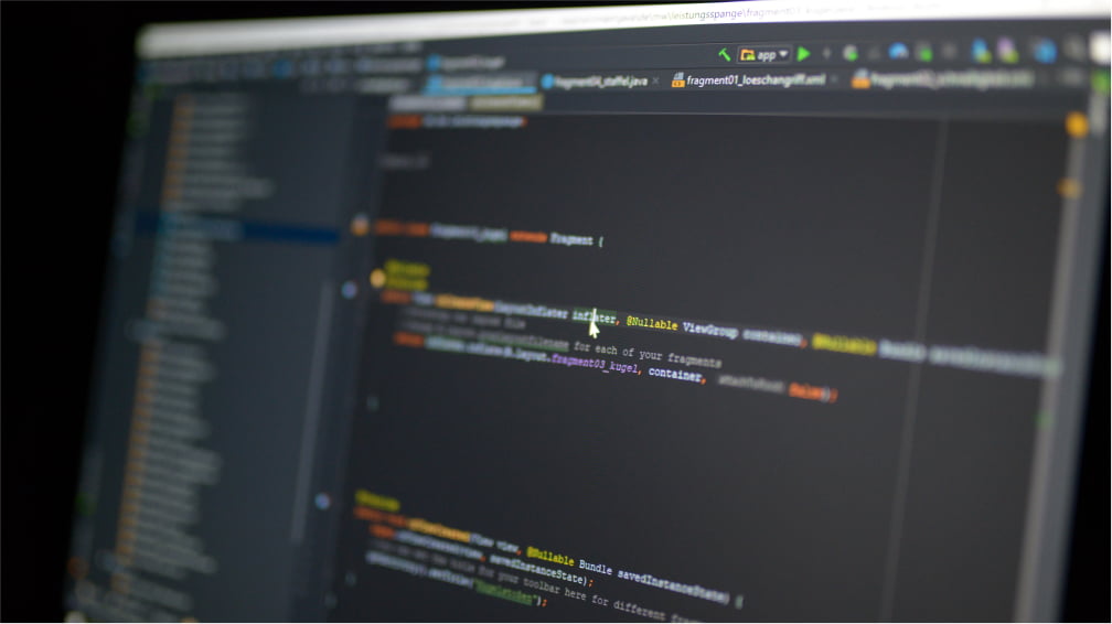 A photo of a software developer's screen displaying an IDE