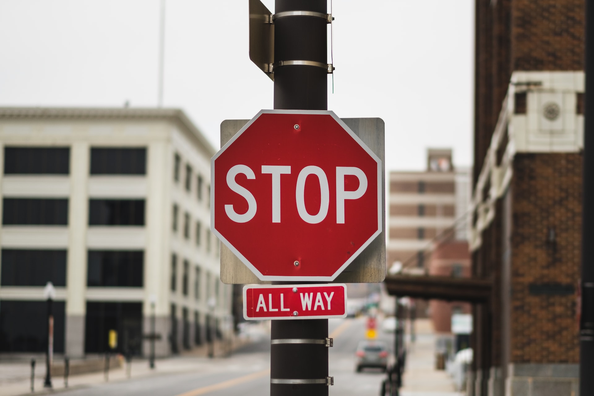 Stop sign posted on a city street.