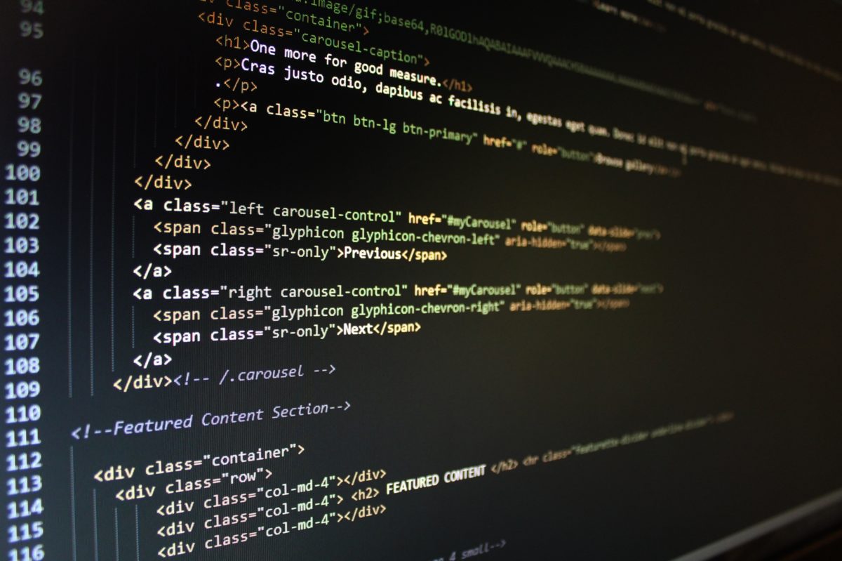 Photo of a computer screen displaying HTML code in an IDE